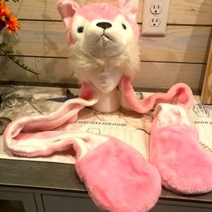 Fun pink fox hat with mittens attached .